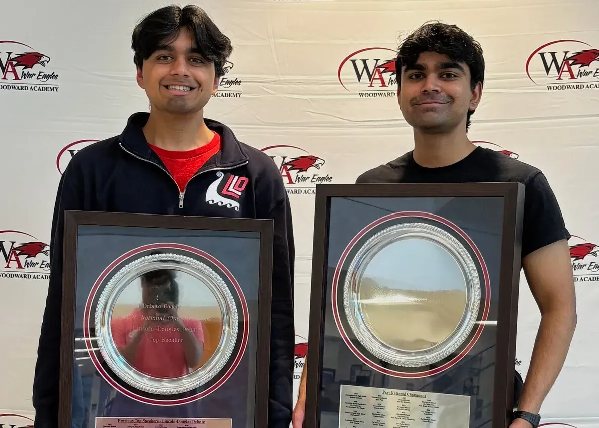 Shreeram and Om holding NDCA Championship trophy